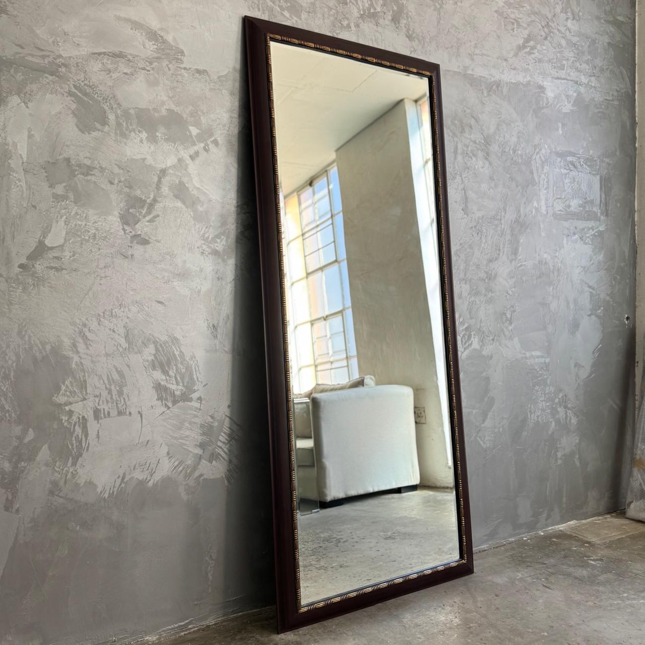 LARGE DARK WOOD MIRROR WITH GOLD TRIMMING