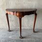 BALL AND CLAW ANTIQUE HALF MOON TABLE